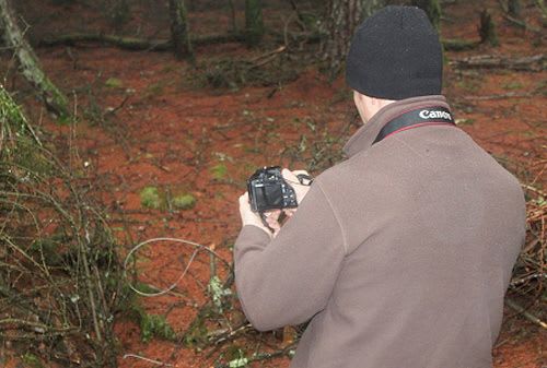 OneKind investigator photographing a snare