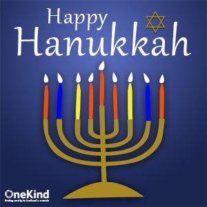 Card with Hanukkah menorah and the words Happy Hanukkah.