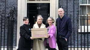 People handing in Target Zero petition to 10 Downing Street