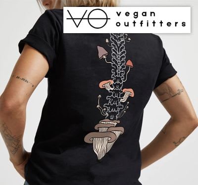 Girl modelling vegan tshirt with graphic on the back.